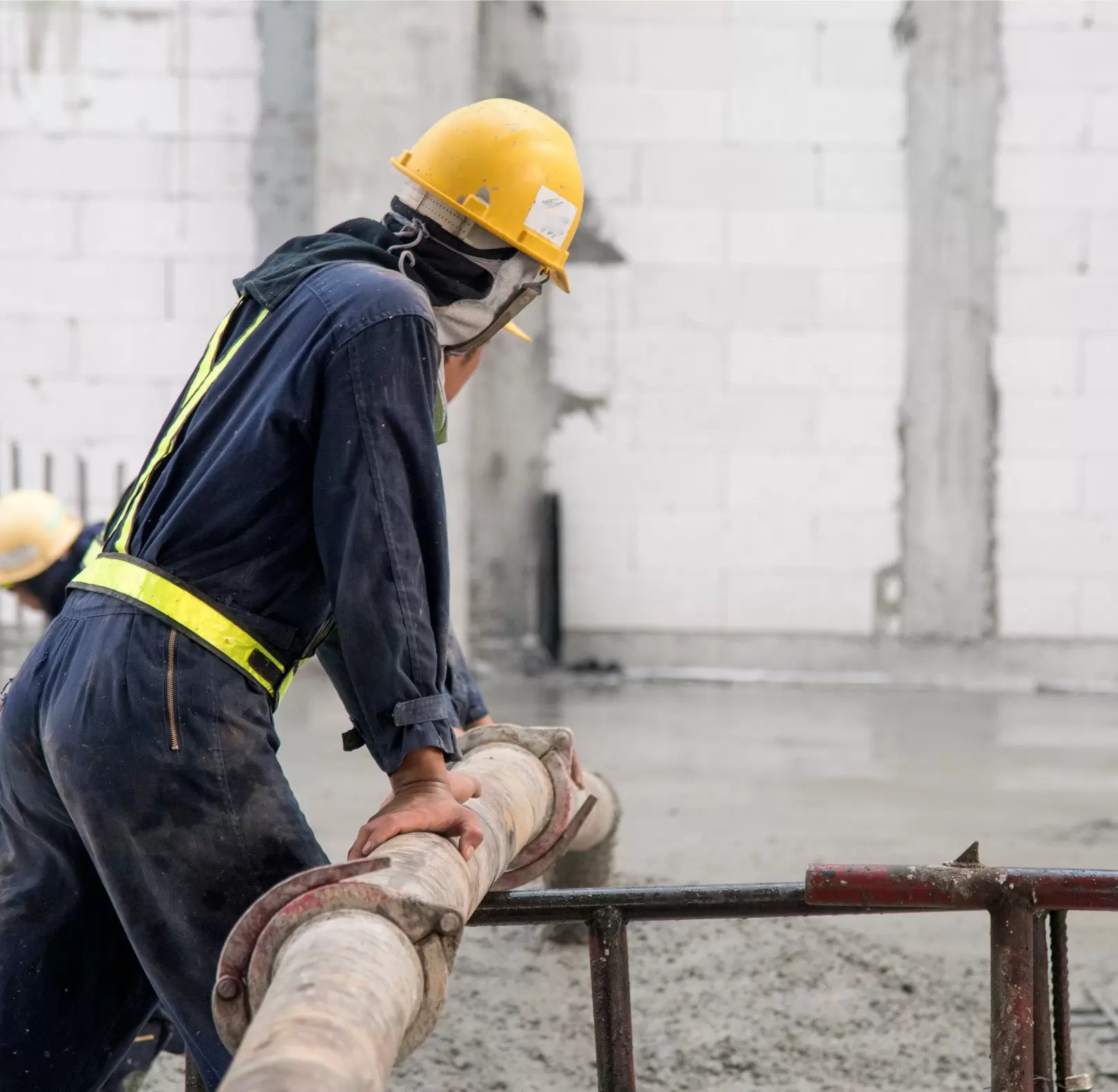 construction-worker-concrete-pouring-commercial-concreting-floors